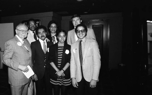 Jerry Buss and others in a group portrait, Los Angeles, 1983