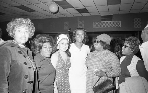 Doris A. Davis posing with others on election night, Compton, 1973