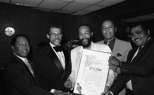 J.B. Stone receiving a commendation at the Pied Piper nightclub, Los Angeles, 1983