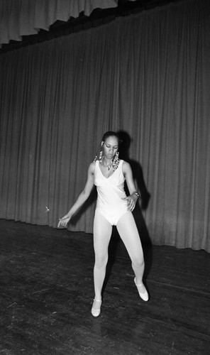 Young woman dancing in a talent show at Dorsey High School, Los Angeles, 1983