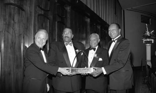 Willie L. Williams receiving a plaque at the Los Angeles Urban League Whitney M. Young Award Dinner, Los Angeles, 1994