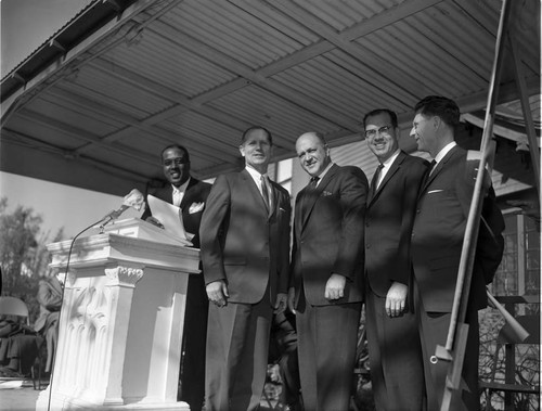 Men at podium, Los Angeles, 1962