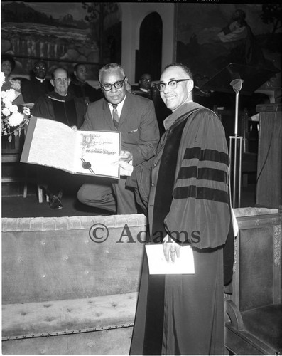 Dr. Thomas Kilgore, Jr. receiving a commendation from Henri O'Bryant, Los Angeles, 1964