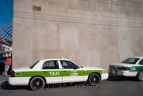 Taxicabs Next to Building, Juárez, 2007