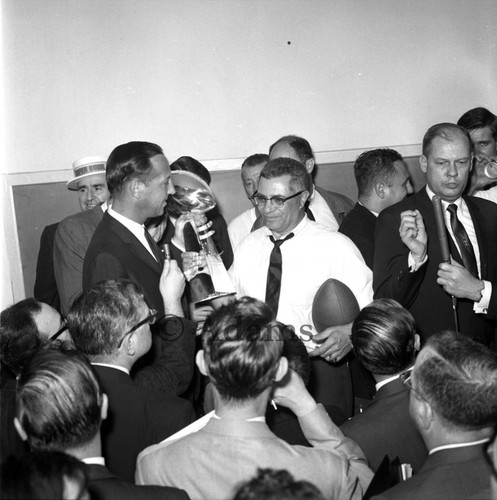 Vince Lombardi receiving the AFL-NFL World Championship trophy, Los Angeles, 1967