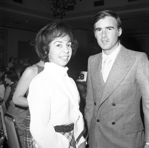 Jerry Brown posing with Teresa Hughes during a special event, Los Angeles, 1973