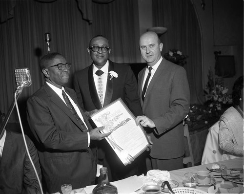 Presentation of certificate, Los Angeles, 1962