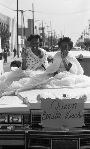 Bonita Vercher waving to the crowd during the South Central Los Angeles Easter Parade, Los Angeles, 1983