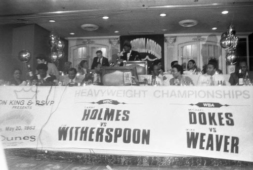 Don King speaking at a press conference for the "Crown Affair" boxing event, Los Angeles, 1983