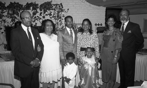 African American family posing together, Los Angeles, 1989