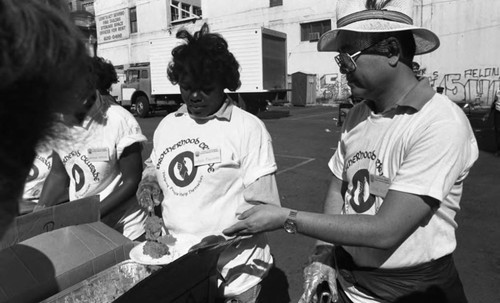 Friends feeding friends, Los Angeles, 1986