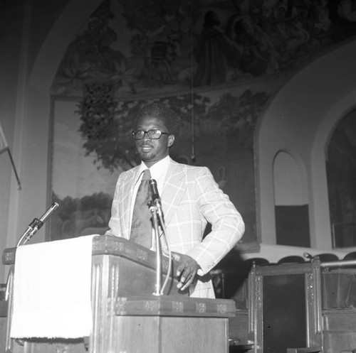 Man at Podium, Los Angeles, 1975