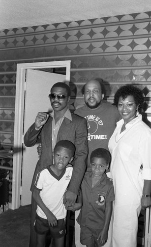 Booker Griffin posing with Aaron Pryor and others, Las Vegas, 1983