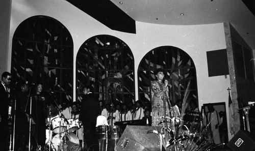 Dionne Warwick and choir members performing at the Leadership Award Gospel Concert, Los Angeles, 1985