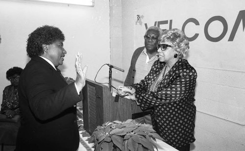 Mayme G. Davis talking from a lectern during a Los Angeles Urban League Head Start event, Los Angeles, 1987