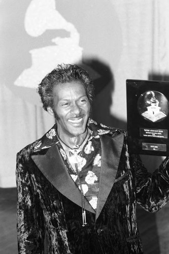 Chuck Berry holding his award at the 26th Annual Grammy Awards, Los Angeles, 1984