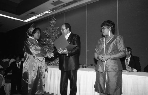 Graduate receiving her diploma, Los Angeles, 1989