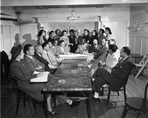 Group portrait of participants during an award presentation, Los Angeles