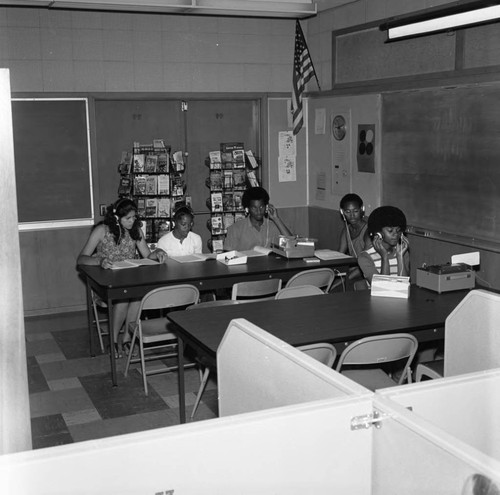 Compton College students listening to audio tapes, Los Angeles, ca. 1972