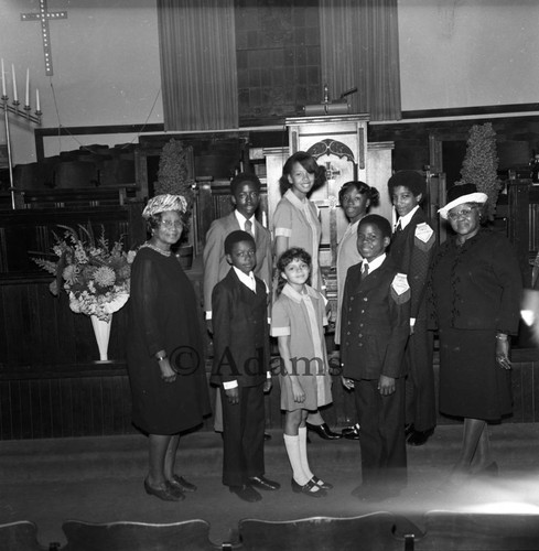 Women and children at church altar, Los Angeles, 1973