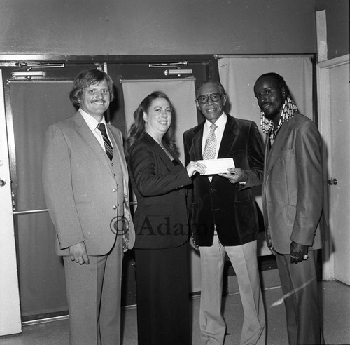 Handing check, Los Angeles, 1982