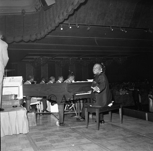 Man at piano, Los Angeles, 1968