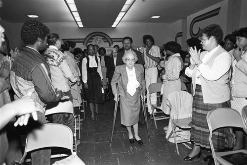 Lillian Rogers Parks and Rosa Parks walking through a Compton Unified School District crowd, Los Angeles, 1983