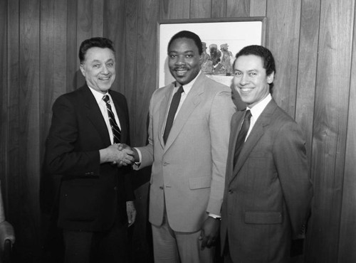 Elbert T. Hudson, Charles R. Anderson, and Paul C. Hudson posing together, Los Angeles, 1986