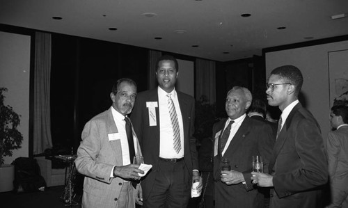 Larry Aubry, Jamaal Wilkes, and John W. Mack, attending a Los Angeles Urban League 70th Anniversary event, Los Angeles, 1991