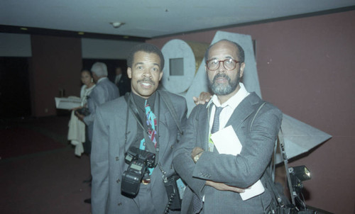 Photographers posing together at an event, Los Angeles, 1992