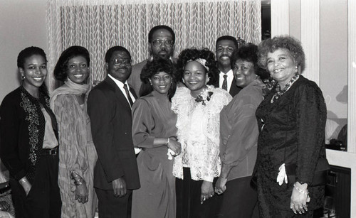 Gloria Brimberry posing with others at a recognition dinner, Los Angeles, 1989