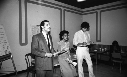 Participants speaking at a Crenshaw Area Commercial Merchants workshop, Los Angeles, 1982