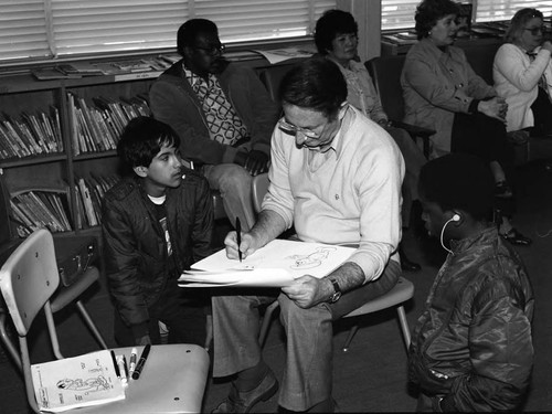 Animation artist Bob Singer drawing Smurfs, Los Angeles, 1985