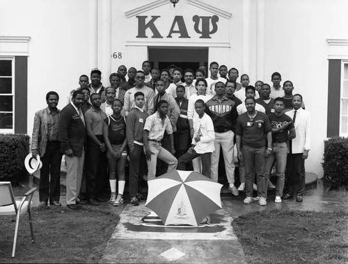 Kappa Alpha Phi, USC chapter members posing in front of their fraternity house, Los Angeles, 1986