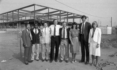 Real estate developers posing on-site for a group portrait, Los Angeles, 1982