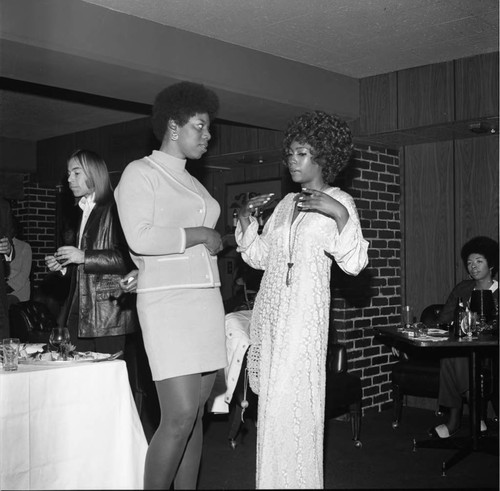 Mary Wilson in conversation at a party, Los Angeles, 1971