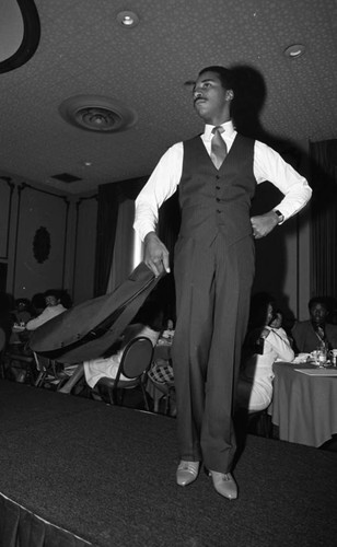 Lula Fields School of Modeling Fashion Show model walking the runway, Los Angeles, 1983