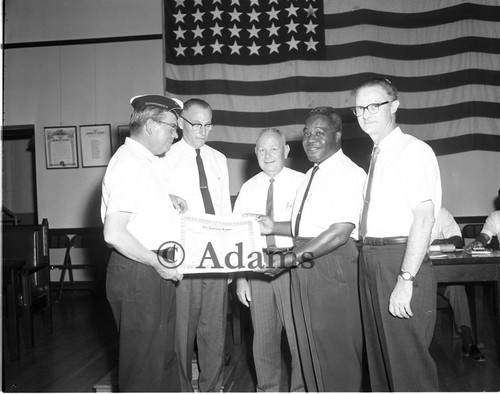 Men during presentation, Los Angeles, 1963