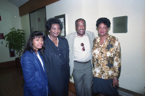 Estella (Bobbe) Akalonu posing with others at her retirement party, Los Angeles, 1993