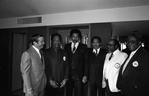 August Busch, III talking with Cal-Pac members during their 9th annual awards banquet, Los Angeles, 1982