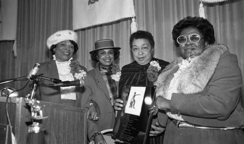 Los Angeles Alumnae Chapter of Delta Sigma Theta members presenting an award, Los Angeles, 1983