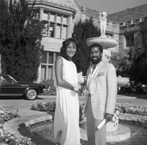 Couple Holding Drinks, Los Angeles, 1980