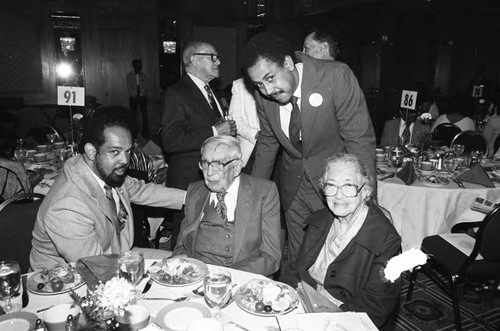 John T. McDonald, III, and Judge Sherman Smith, Jr. posing with H. Claude Hudson and Helen Green, Los Angeles, 1984