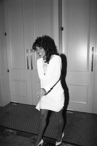 Woman attending Magic Johnson's birthday party, Los Angeles, 1985