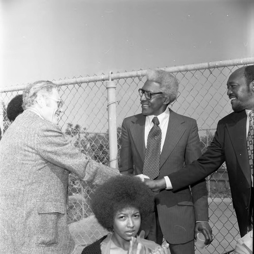 Bayard Rustin talking with Sigmund Arywitz and Samuel McNeal, Jr., Los Angeles, 1973