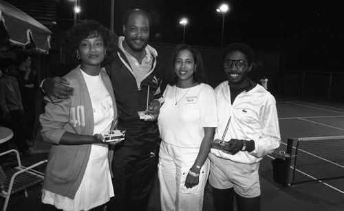 Franklin Ajaye posing with others at an Urban League event, Los Angeles, 1985