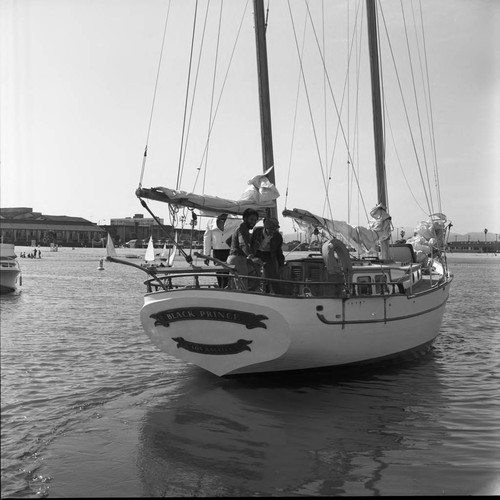 Attorney Burns and two other men departing from a marina on board the "Black Prince."