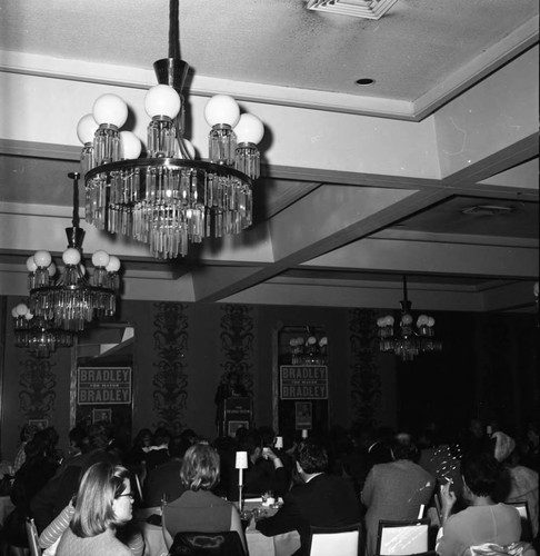 Crowd sitting in a ballroom at a Tom Bradley mayoral campaign event, Los Angeles, 1969