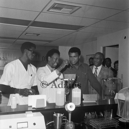Muhammad Ali in hospital lab, Los Angeles, 1972 — Calisphere