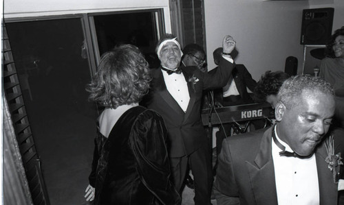 Danny Bakewell dancing at a formal event, Los Angeles, 1990